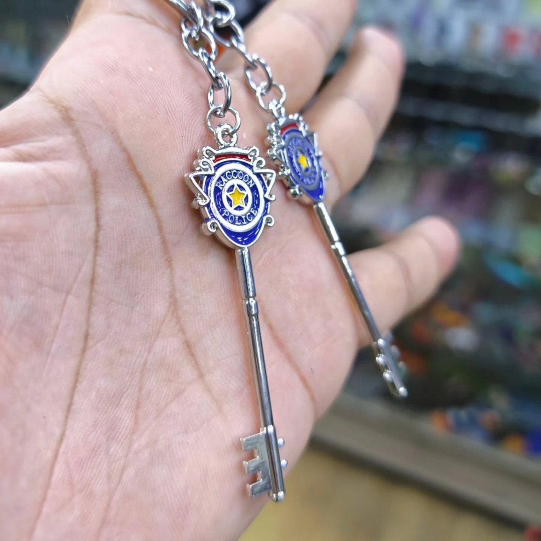 Resident Evil Raccoon Police Keychain - Keychain